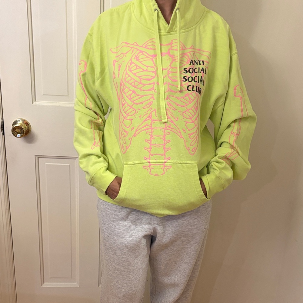 Anti Social Social Club Yellow/Green Hoodie with Pink Skeleton Design
